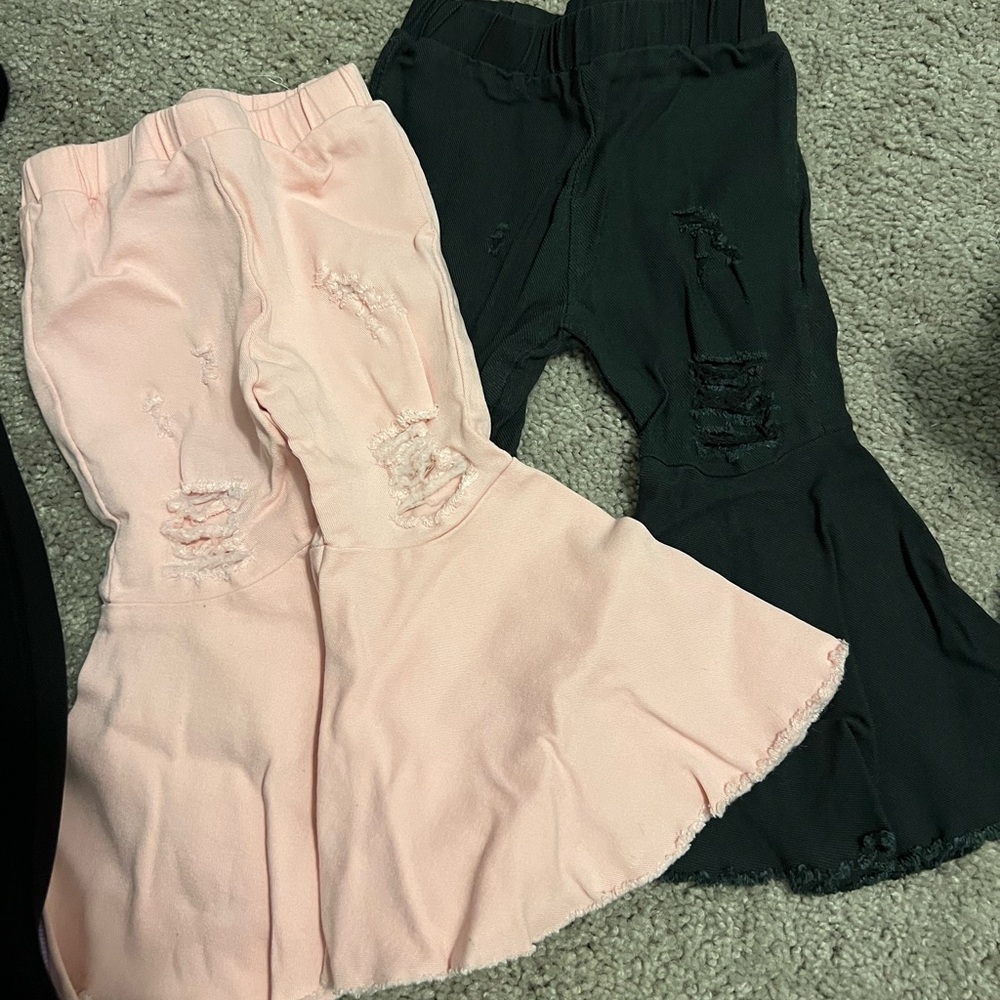 SOLD Two pairs of flair jeans- 9/12M